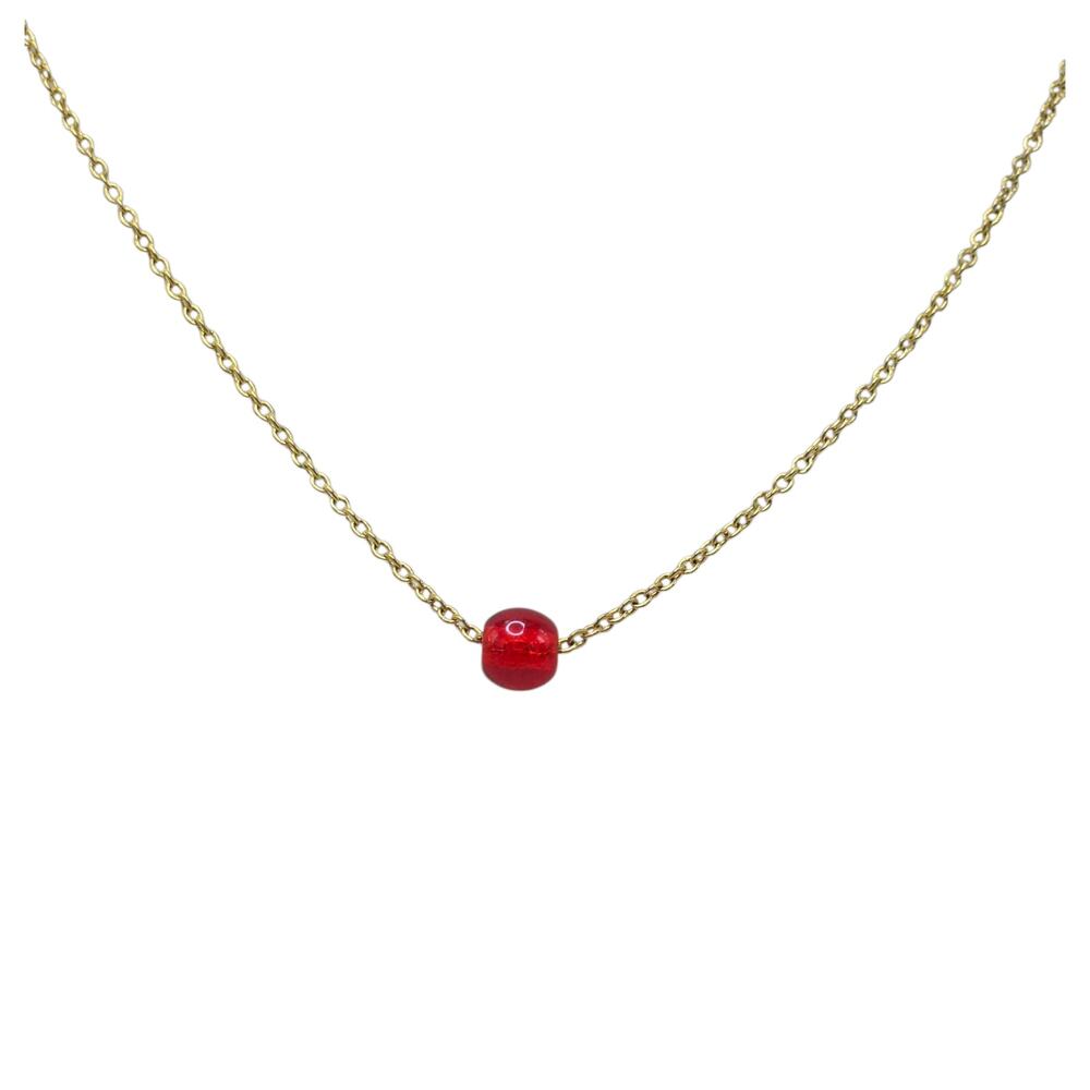 Vintage Necklace with a gold-tone chain and floating red glass bead